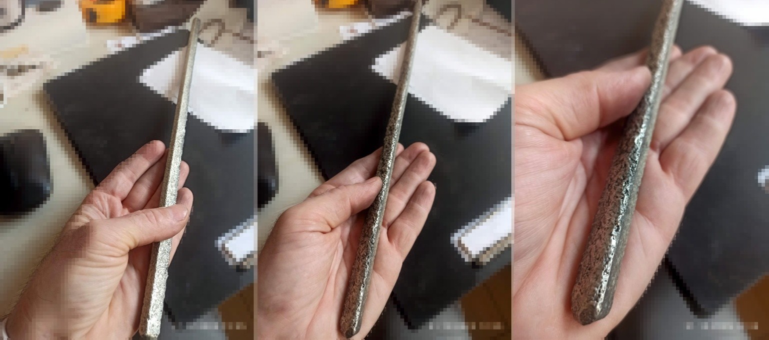 Multiple close-up views of TechCarbide welding rods held in a hand against a dark surface with white blocks in the background. The rods display textured, granular surfaces showing tungsten carbide particle distribution embedded in a metallic matrix. The silvery-gray composite material reveals the characteristic hard-facing overlay with visible carbide particles throughout. The images from different angles demonstrate the physical appearance and construction quality of the welding rods used for drilling tool repair and hard-facing applications.